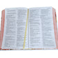 Biblia Tamaño Manual RV1960, tapa dura blanco y coral con canto floral